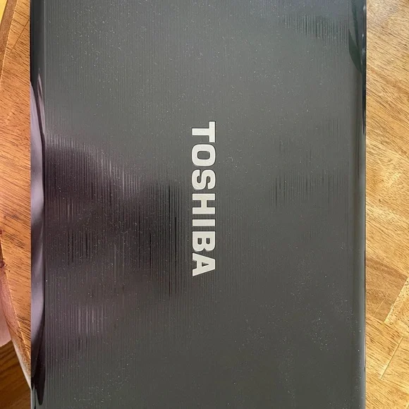 Toshiba Black Laptop with Windows working well but it’s old